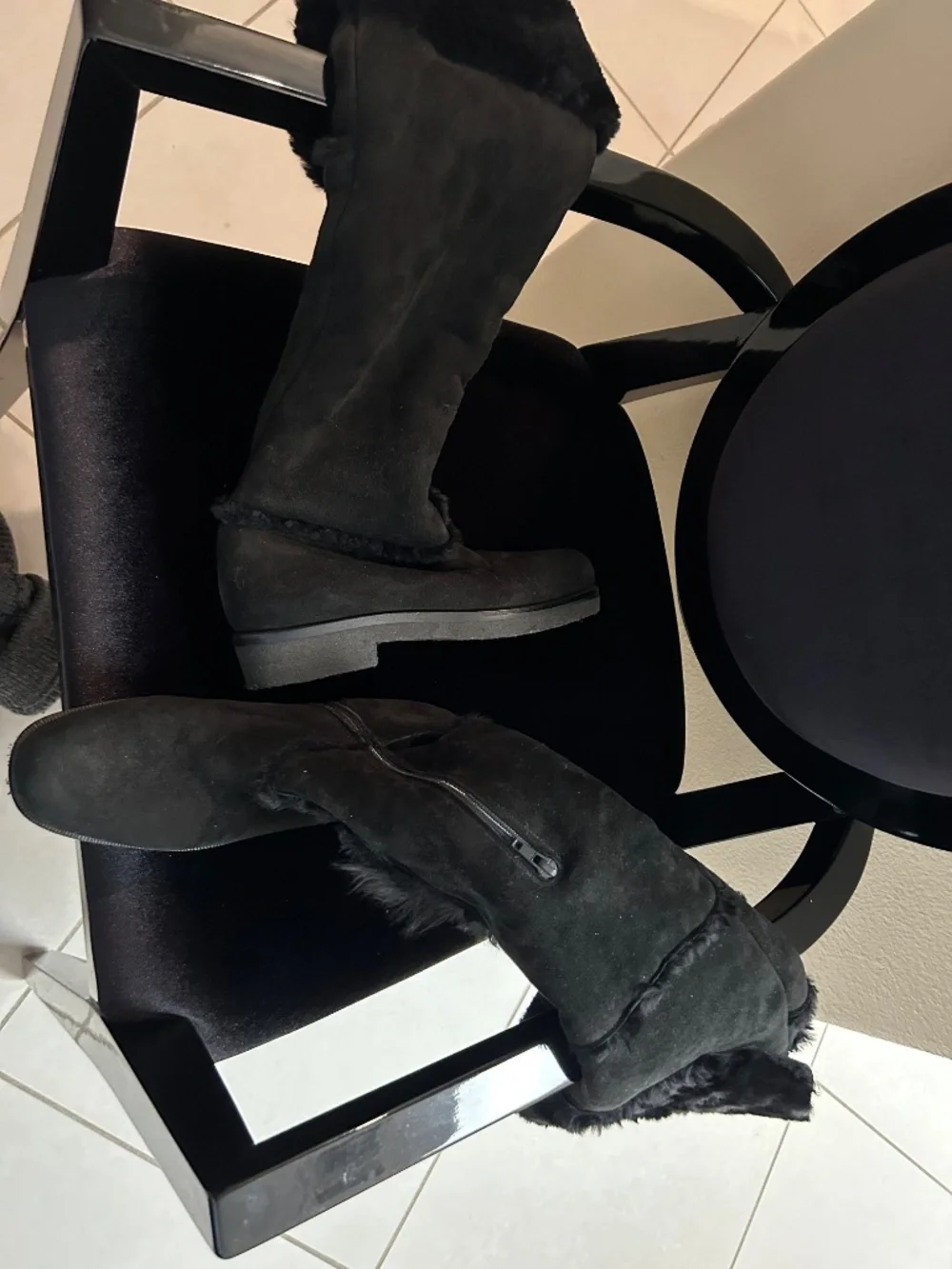 Black designer knee high suede boots